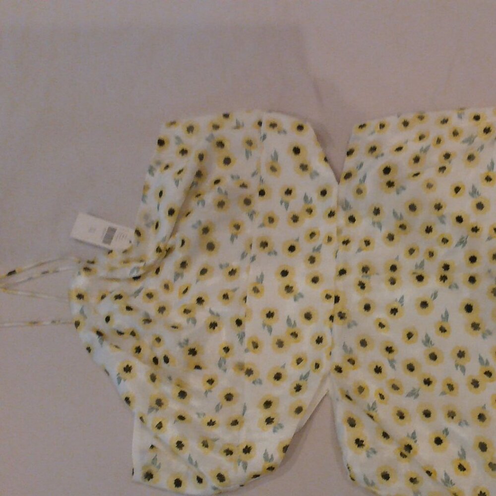 NWT Daisy print Halter style Romper by Anthopologie.  Size 14.